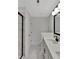 Bathroom featuring double sinks with marble flooring and a glass shower at 518 Fleming Rd, Charleston, SC 29412