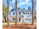 Charming new construction with a two-car garage and welcoming covered entryway at 518 Fleming Rd, Charleston, SC 29412