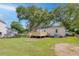 Spacious backyard with a wooden deck, perfect for enjoying the outdoors and entertaining guests at 5904 Oak Street, Hanahan, SC 29410