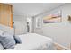 Relaxing bedroom with a comfy bed, hardwood floors, and an ensuite bathroom at 5904 Oak Street, Hanahan, SC 29410
