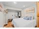 Cozy bedroom with a comfortable bed, open closet, and natural lighting at 5904 Oak Street, Hanahan, SC 29410