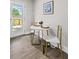 Charming breakfast nook featuring a small table, two chairs, and natural light at 5904 Oak Street, Hanahan, SC 29410