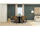 Modern dining area featuring a round table with woven chairs and hardwood floors at 620 Culpepper St, Summerville, SC 29486