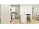 Bright kitchen with white cabinetry, stainless steel appliances, and a breakfast bar at 620 Culpepper St, Summerville, SC 29486