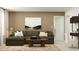 Comfortable living room features a neutral color palette, stylish furniture, and a decorative rug at 620 Culpepper St, Summerville, SC 29486