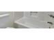 Bathroom detail showing clean white tub/shower combo and toilet at 6275 Rolling Fork Rd # 401, North Charleston, SC 29406