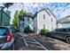 Charming two-story home featuring light blue siding, white trim, and a private parking area at 6275 Rolling Fork Rd # 401, North Charleston, SC 29406