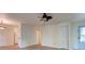 Open-concept living room with wood floors is attached to kitchen, offering easy access at 6275 Rolling Fork Rd # 401, North Charleston, SC 29406