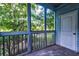 Enjoy nature from this screened porch with views of the trees and access to outdoor living at 6275 Rolling Fork Rd # 401, North Charleston, SC 29406