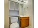 Bathroom featuring a vanity, toilet, mirror and a built in cabinet at 6280 Rolling Fork Rd # 302, North Charleston, SC 29406