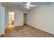 Bedroom with neutral walls, carpeted floor and an ensuite bathroom at 6280 Rolling Fork Rd # 302, North Charleston, SC 29406