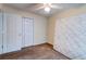 Bedroom featuring a neutral color palette, closet, carpeted floor, and a ceiling fan at 6280 Rolling Fork Rd # 302, North Charleston, SC 29406