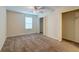 Bedroom with neutral walls, carpeted floor, closet and a window at 6280 Rolling Fork Rd # 302, North Charleston, SC 29406