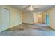 Bright living room with a ceiling fan and a view of the hallway and the front door at 6280 Rolling Fork Rd # 302, North Charleston, SC 29406