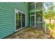 This home features a covered patio with a screened-in door, offering a relaxing outdoor space at 6280 Rolling Fork Rd # 302, North Charleston, SC 29406