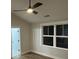 Bedroom featuring an illuminated ceiling fan and a pair of large windows providing ample natural light at 641 Magnolia Rd, Charleston, SC 29407