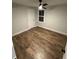 Bedroom featuring modern ceiling fan, natural light, and wood floors at 641 Magnolia Rd, Charleston, SC 29407