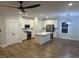Spacious kitchen with white cabinetry, stainless steel appliances, and a large center island at 641 Magnolia Rd, Charleston, SC 29407