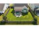 Beautiful backyard featuring well-maintained lawn, pergola, and patio seating area at 658 Yellow Leaf Ln, Summerville, SC 29486