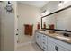 Double vanity with marble counters and large framed mirror at 658 Yellow Leaf Ln, Summerville, SC 29486
