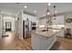 Modern kitchen featuring stainless steel appliances, granite countertops and hardwood floors at 658 Yellow Leaf Ln, Summerville, SC 29486