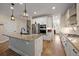 Modern kitchen featuring stainless steel appliances, granite countertops and hardwood floors at 658 Yellow Leaf Ln, Summerville, SC 29486