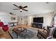 Spacious living room with ceiling fans and hardwood flooring throughout the open floor plan at 658 Yellow Leaf Ln, Summerville, SC 29486