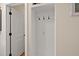 Built in mudroom shelves and coat hooks by doorway at 658 Yellow Leaf Ln, Summerville, SC 29486