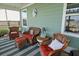 Cozy porch with comfortable furniture, a ceiling fan, and decorative accents at 658 Yellow Leaf Ln, Summerville, SC 29486