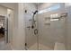 Walk-in shower with glass enclosure and built-in niche at 658 Yellow Leaf Ln, Summerville, SC 29486