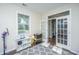 Bright bonus room with natural light and glass french doors leading to an office area at 72 Crossandra Ave, Summerville, SC 29483