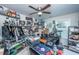 A well-lit office space complete with a ceiling fan and ample room for storage and display at 72 Crossandra Ave, Summerville, SC 29483