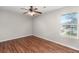 Bedroom with window and wood floors at 7814 Nummie Ct, North Charleston, SC 29418