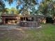 Spacious backyard featuring a above ground pool and patio area, perfect for outdoor entertainment and relaxation at 8334 Witsell St, North Charleston, SC 29406