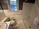 Bathroom featuring tiled floors, a stand up shower, toilet and sink at 8334 Witsell St, North Charleston, SC 29406