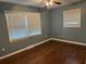Bedroom featuring wood floors and natural light from windows at 8334 Witsell St, North Charleston, SC 29406