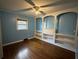 Charming bedroom with unique built-in shelving and a window at 8334 Witsell St, North Charleston, SC 29406
