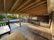Exterior view of wooden deck featuring above ground swimming pool at 8334 Witsell St, North Charleston, SC 29406