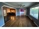 Bright living room featuring hardwood floors and a view into the kitchen at 8334 Witsell St, North Charleston, SC 29406