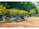 Community dog park featuring a bench, agility ramps, and jump hoops, providing a fun outdoor space for pets at 93 French Garden Cir, Summerville, SC 29486