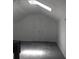 This attic features a bright skylight, plush carpet, and ample storage within the closet at Way, Goose Creek, SC 29445