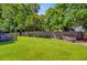 Spacious, well-maintained backyard featuring a wooden fence and lush green grass at 104 Study Ct, Ladson, SC 29456