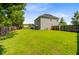 View of the expansive backyard and privacy fence at 104 Study Ct, Ladson, SC 29456