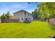View of the expansive backyard with a privacy fence and patio at 104 Study Ct, Ladson, SC 29456