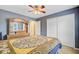 Bedroom features a ceiling fan and a closet with sliding doors at 104 Study Ct, Ladson, SC 29456