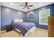 Bedroom features a ceiling fan, an exterior window, and a side table at 104 Study Ct, Ladson, SC 29456