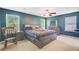 A primary bedroom features neutral carpet and a large bed with drawer storage at 104 Study Ct, Ladson, SC 29456