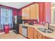 Functional kitchen showcasing essential appliances, neutral countertops and abundant storage at 104 Study Ct, Ladson, SC 29456