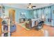 Comfortable living room with hardwood floors, blue walls, and lots of natural light at 104 Study Ct, Ladson, SC 29456