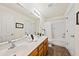 Bathroom with double sink vanity, large mirror, and shower-tub combo at 105 Brockman Way, Goose Creek, SC 29445